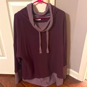 Burgundy colored long sleeve shirt